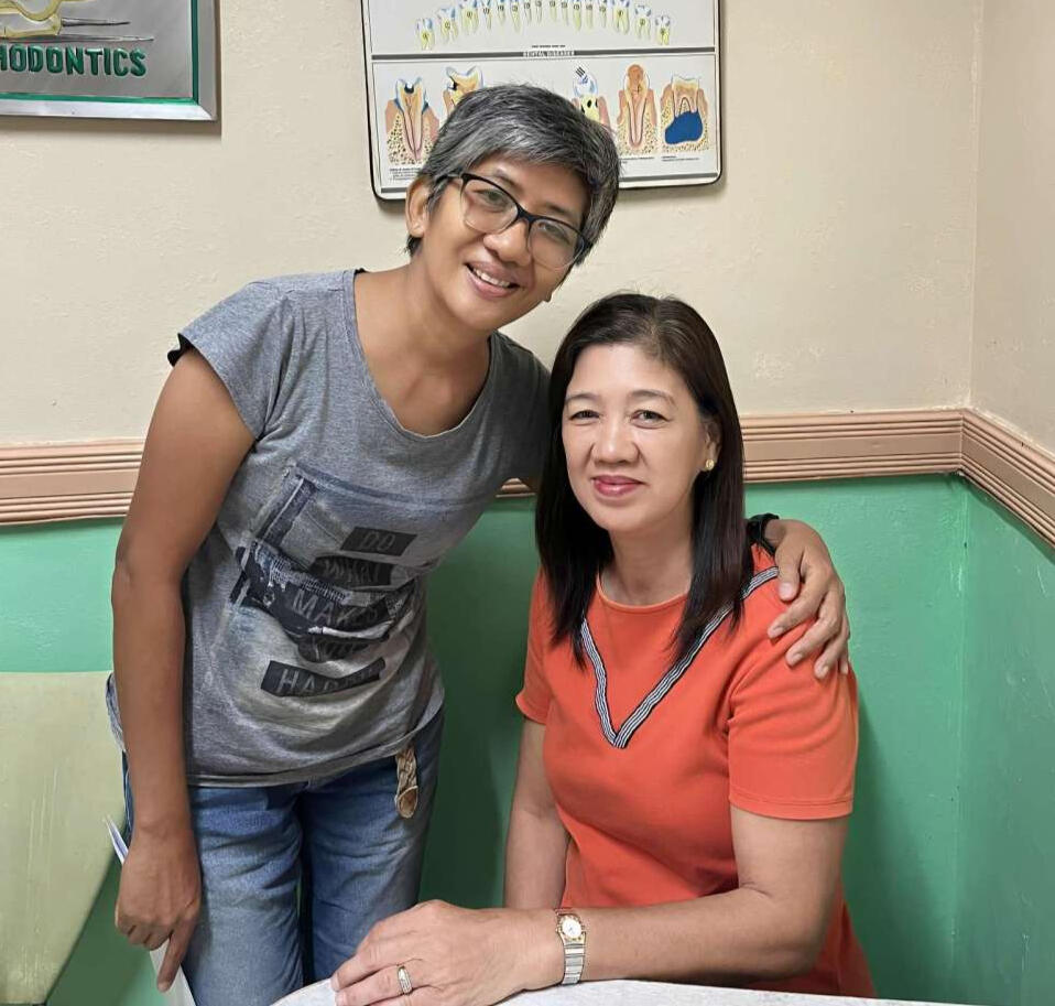 PCLM Staff Cynthia Martal with PCLM Mission Partner Dr. Jessica Galicia Jaen at her dental clinic in Davao City. She has been supporting our missioners since 1994!